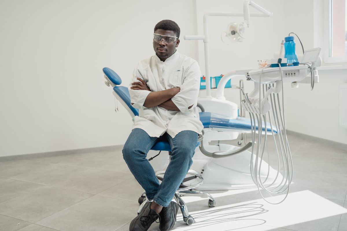 Dentist seated and ready in a modern dental clinic