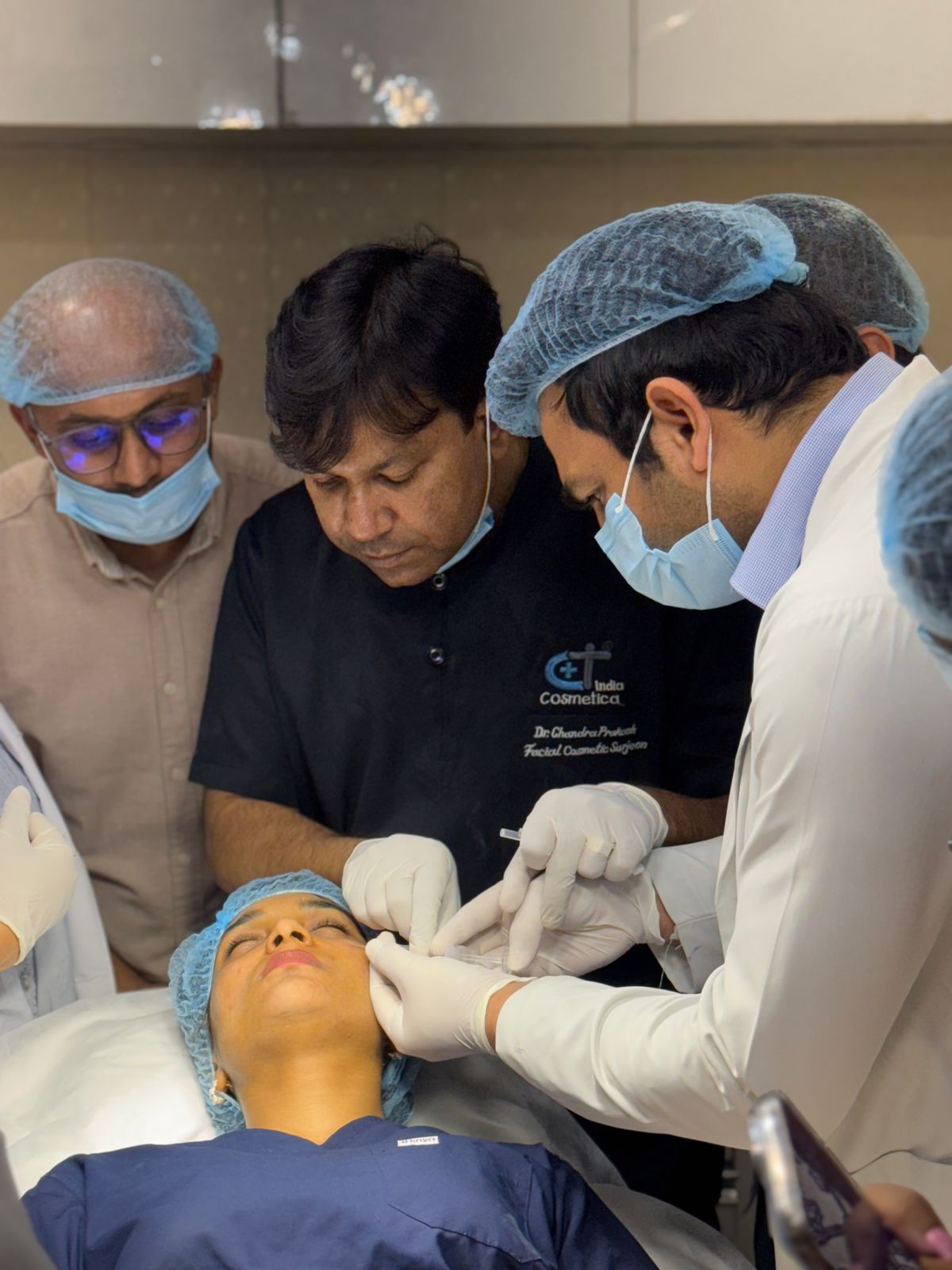 Dermatologist performing a cosmetic skin treatment in clinic