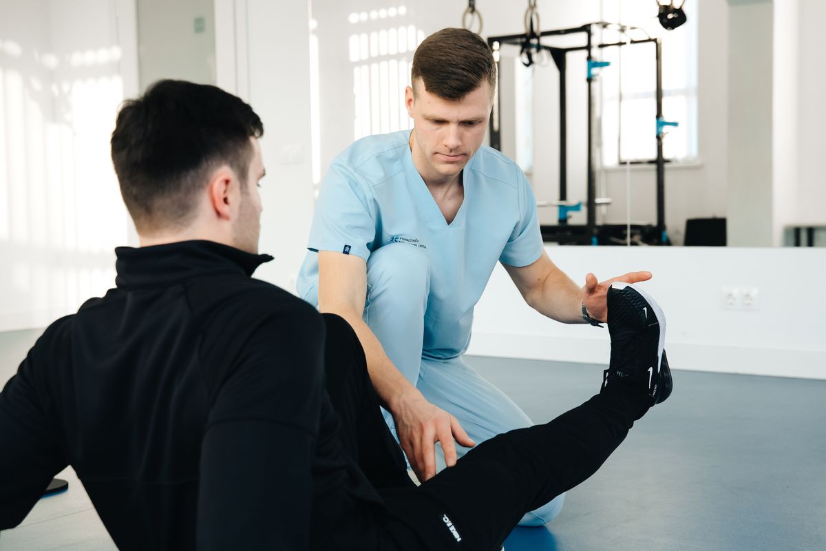Orthopedic surgeon examining a knee X-ray